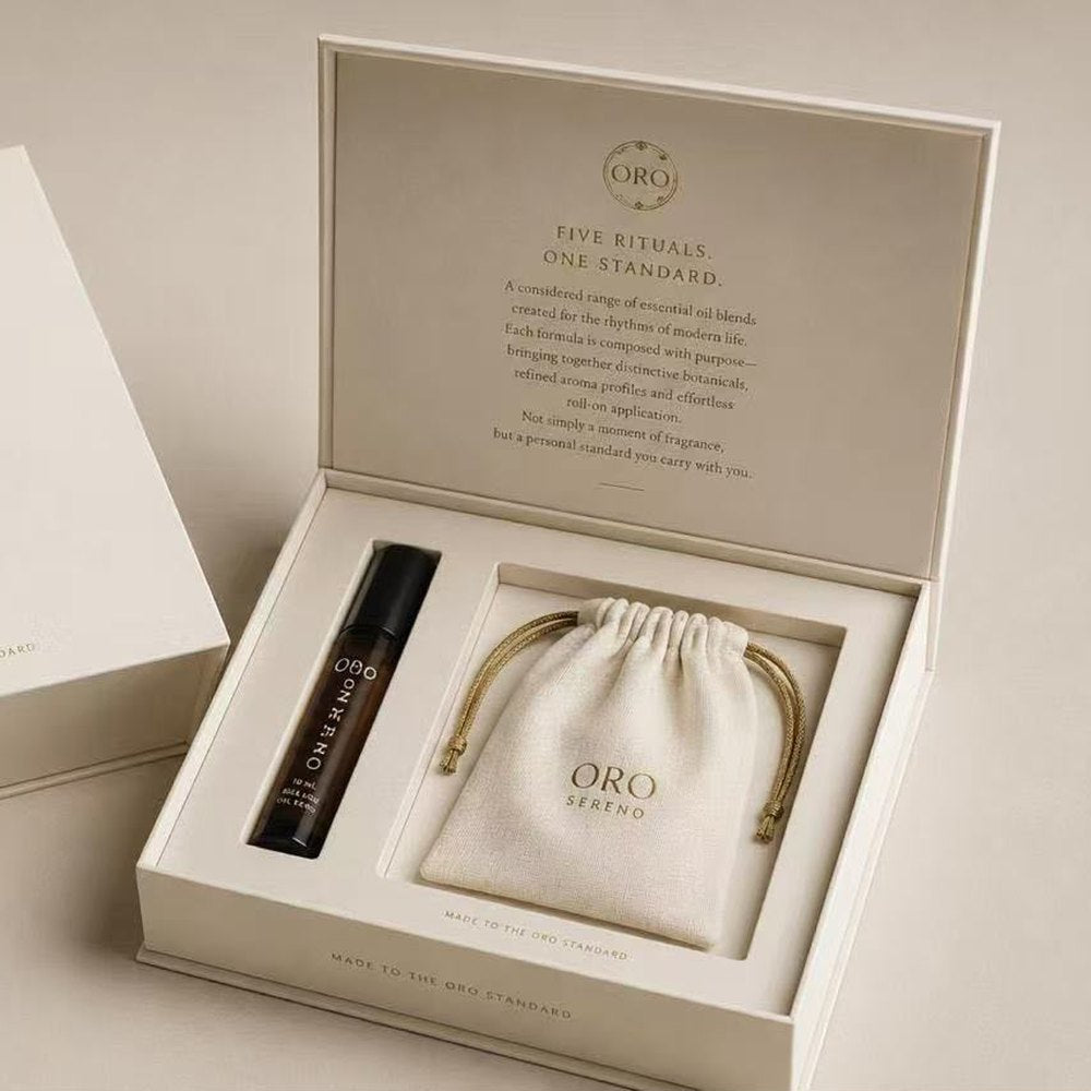 The Oro Sereno box, open, with the roll-on and pouch